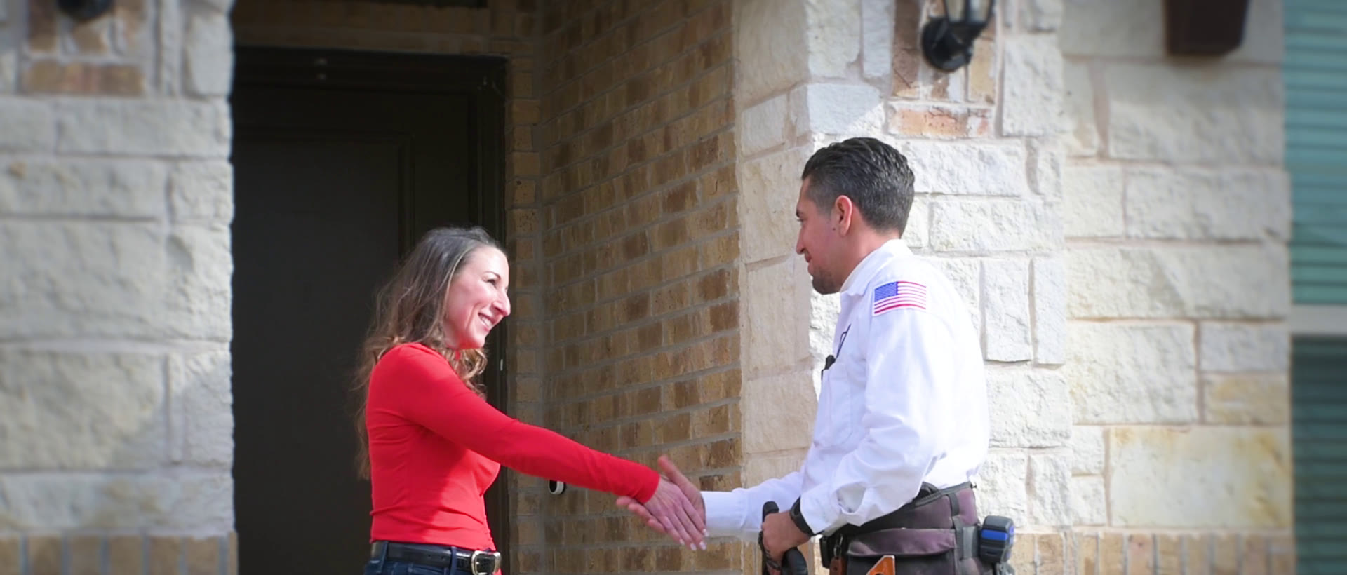 Mister Sparky electrician greeting a North Texas homeowner